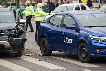 Car damaged from a crash, illustrating the consequences of a Florida rideshare accident - The Law Offices of Luke T. Moreau, ESQ.